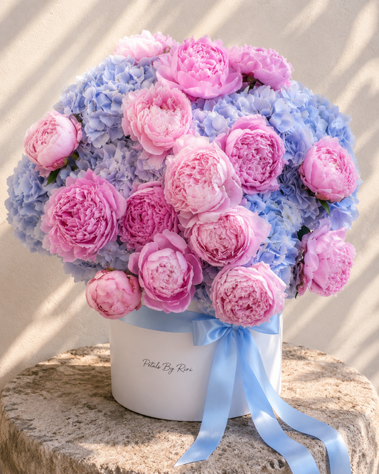 Cotton Candy luxury pastel pink floral hatbox arrangement – Petals by Riri Dubai