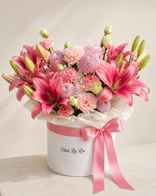 Pink Éclat luxury pink floral hatbox arrangement – Petals by Riri Dubai