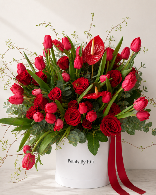 Red Affair luxury red rose hatbox arrangement – Petals by Riri Dubai