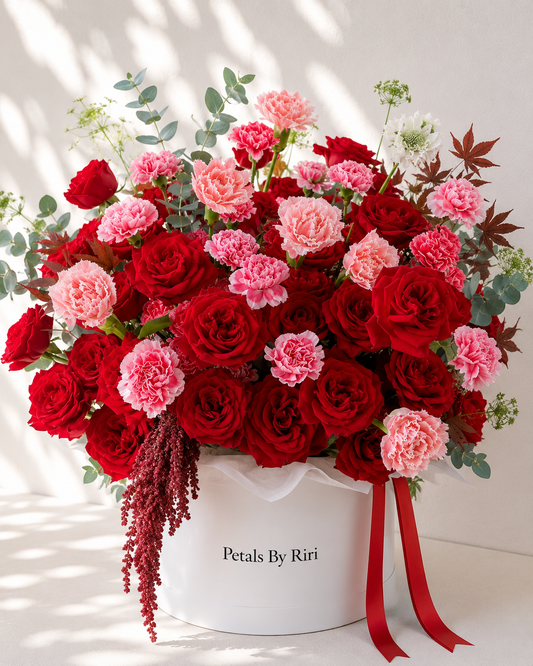 Rosé Romance luxury pink rose hatbox arrangement – Petals by Riri Dubai